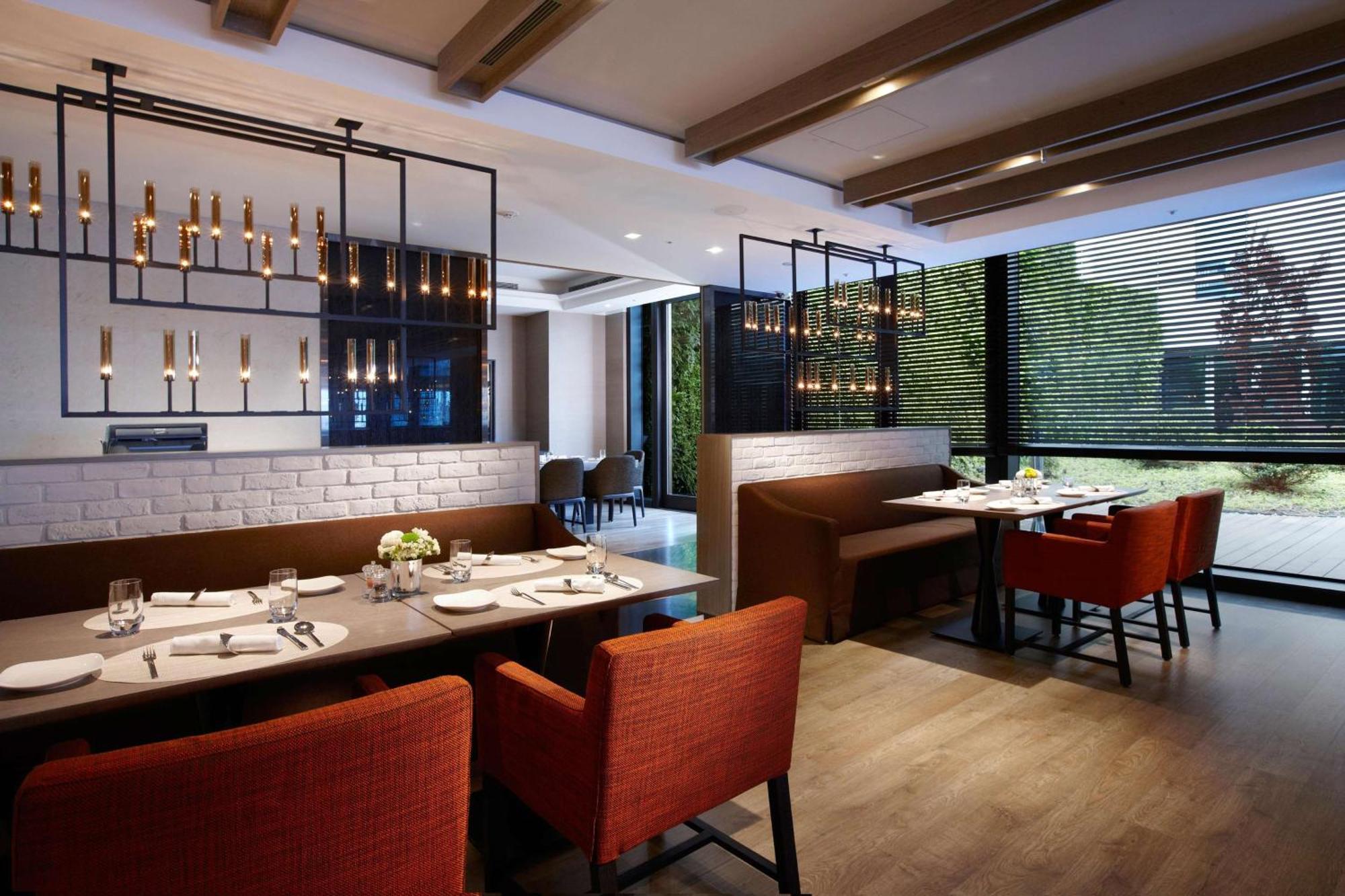 Hotel Humble House Taipei, Curio Collection By Hilton Exteriér fotografie The interior of the restaurant